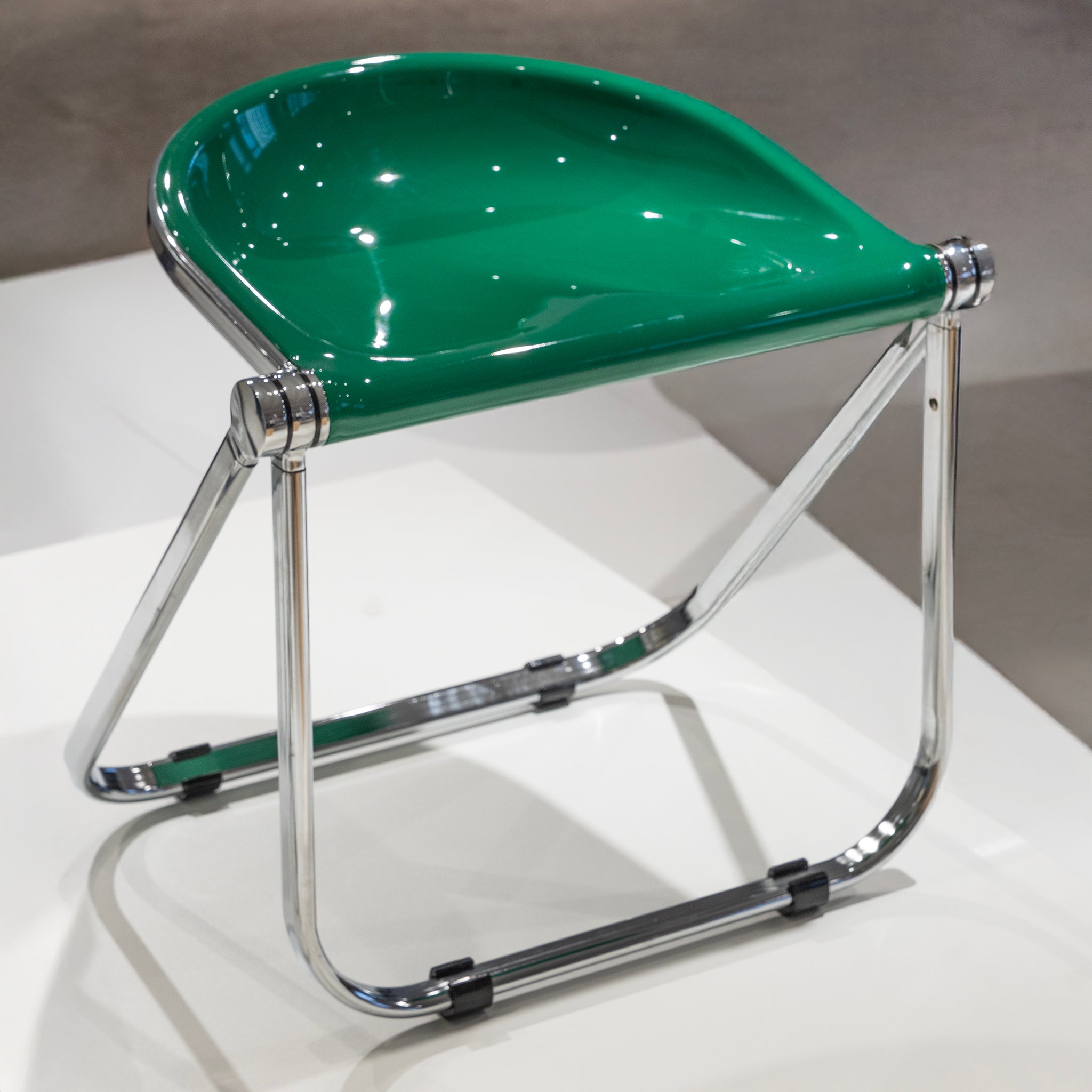 Sleek Chrome Folding Stool