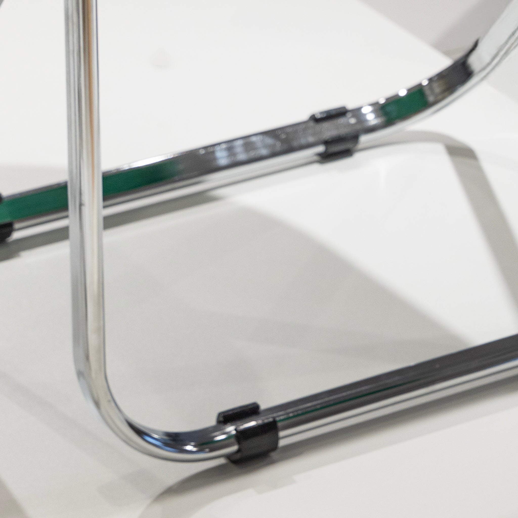 Sleek Chrome Folding Stool