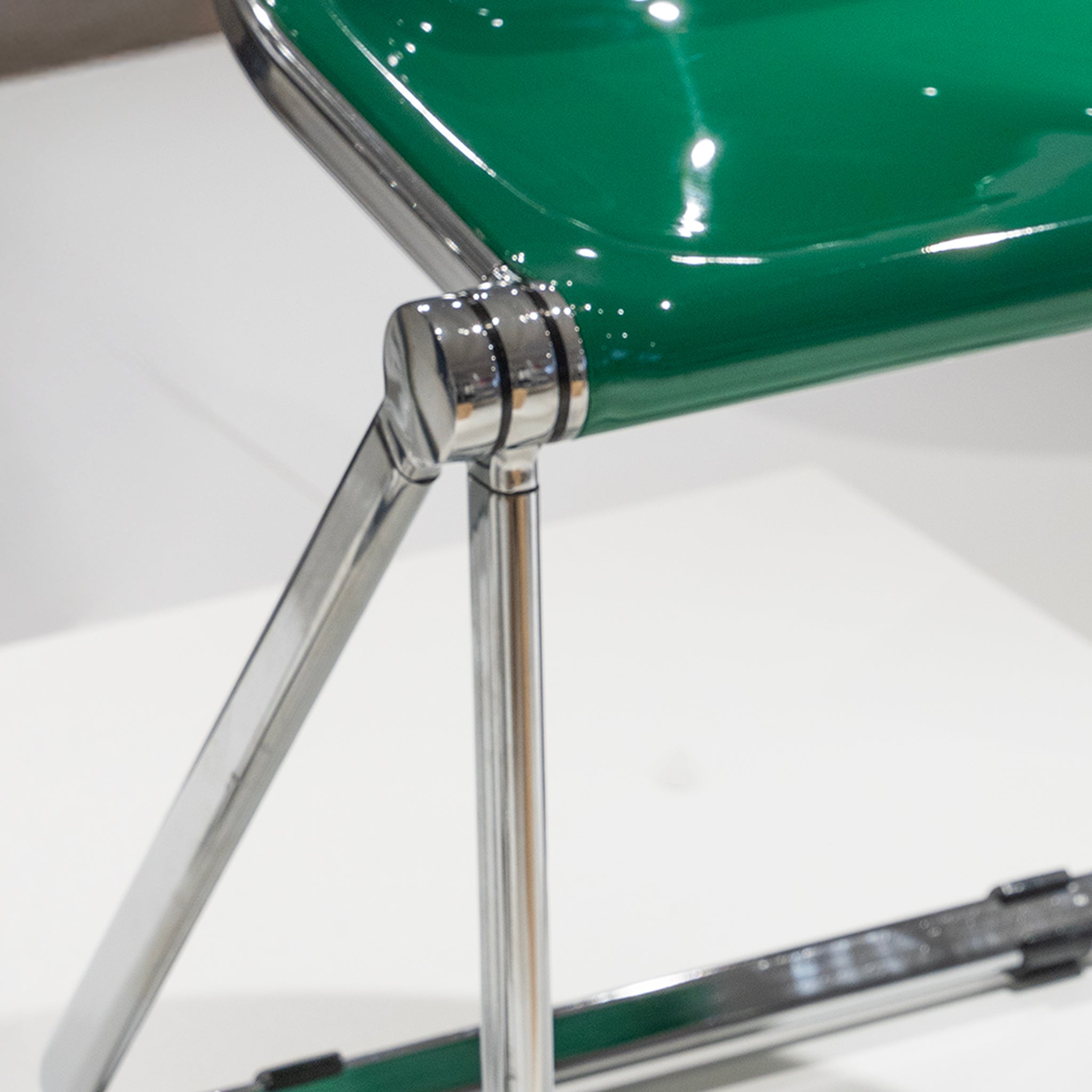 Sleek Chrome Folding Stool