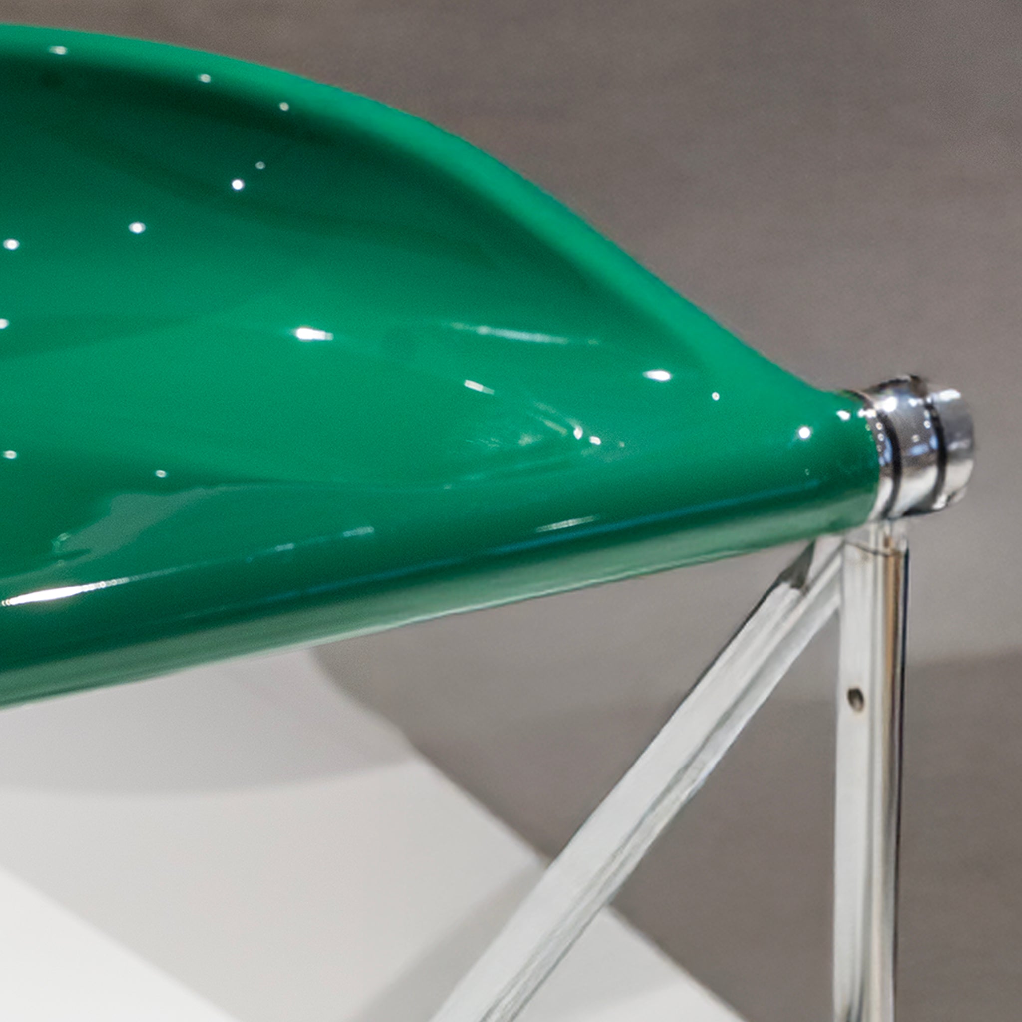 Sleek Chrome Folding Stool